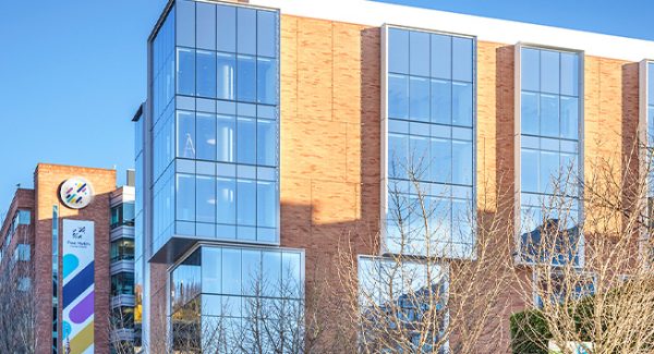 Image of the Fred Hutch Cancer Center South Lake Union Building.